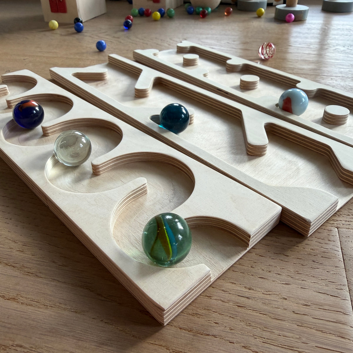 3 different marble run plate sets
